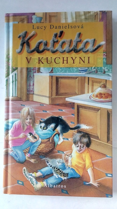 Koťata v kuchyni